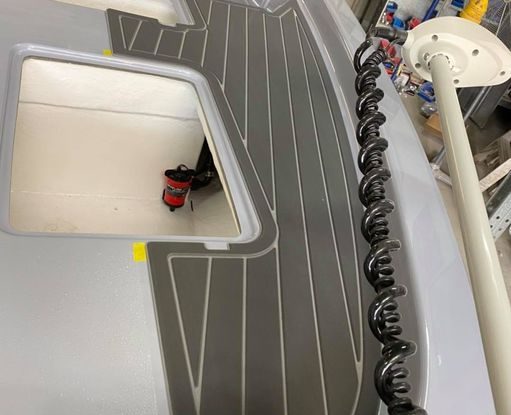 The Force F13 Fisher is having the Udek floor installed.  The final touches are coming together and we are looking forward to sharing the completed boat soon!