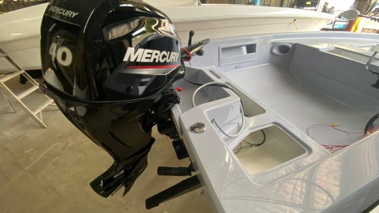 40hp, 4 stroke 3 cylinder electric start Mercury engine is installed!  The Force F13 Fisher is coming together nicely!